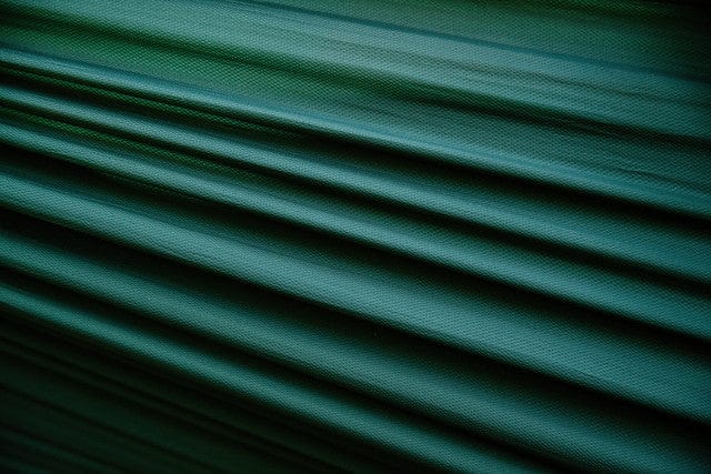 Super strong kammok hammock fabric, Gravitas™ 40D diamond ripstop nylon fabric in Pine Green.