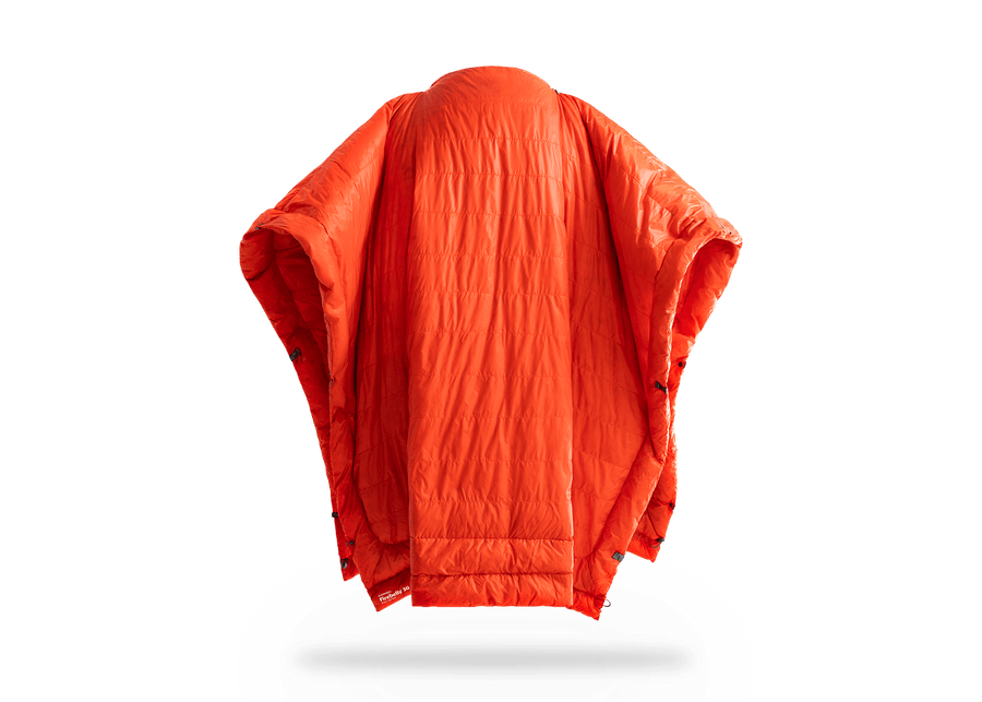 Studio Image of Kammok Trail Quilt Firebelly 30°F in Poncho Mode.