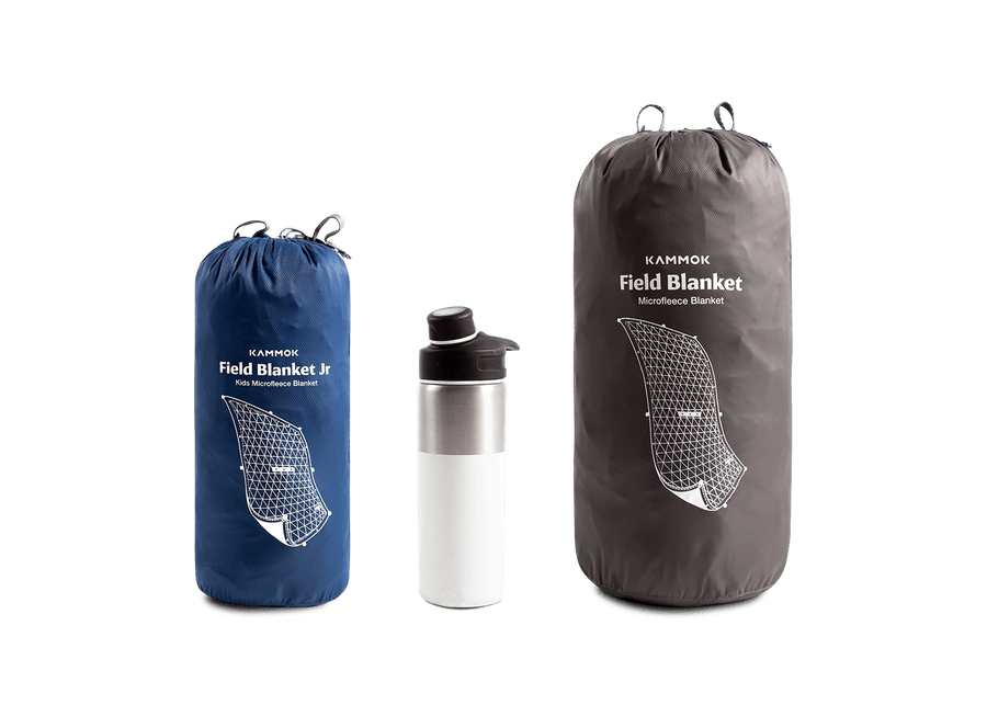 Kammok Blanket Field Blanket Jr. and Fuol Size next to a water bottle for size comparison.