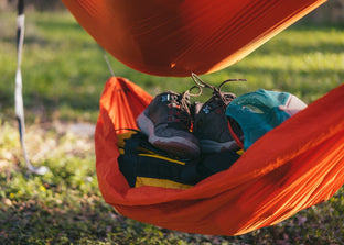 Shoes & Gear stacked in Kammok Storage Joey Gear Sling