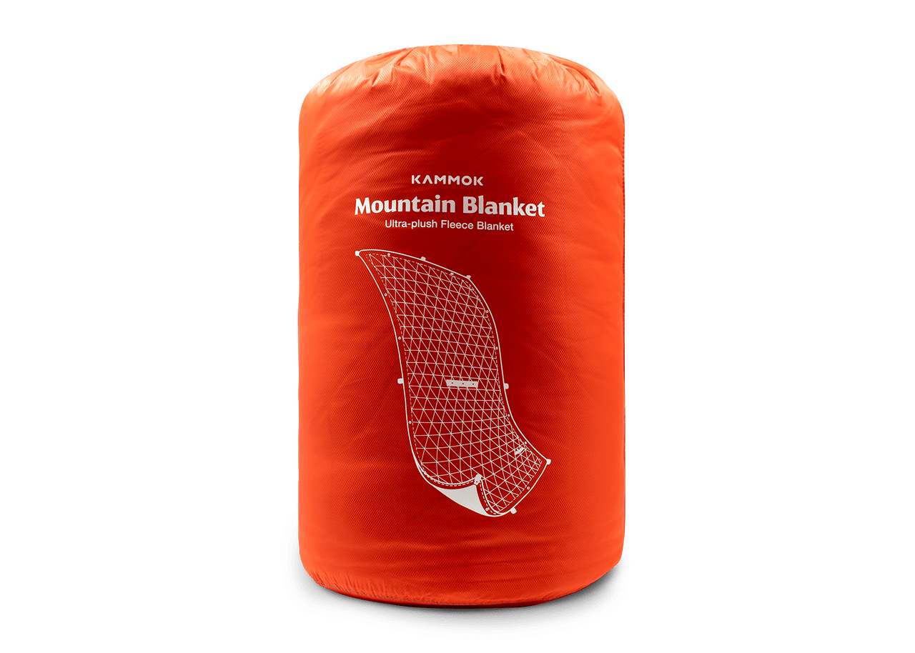 Studio Image of a Kammok Blanket Mountain Blanket in storage bag.