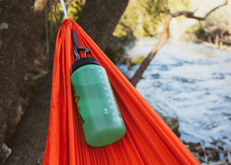 Close up of Kammok Hammock Roo Double attached to Python Straps with water bottle attached.