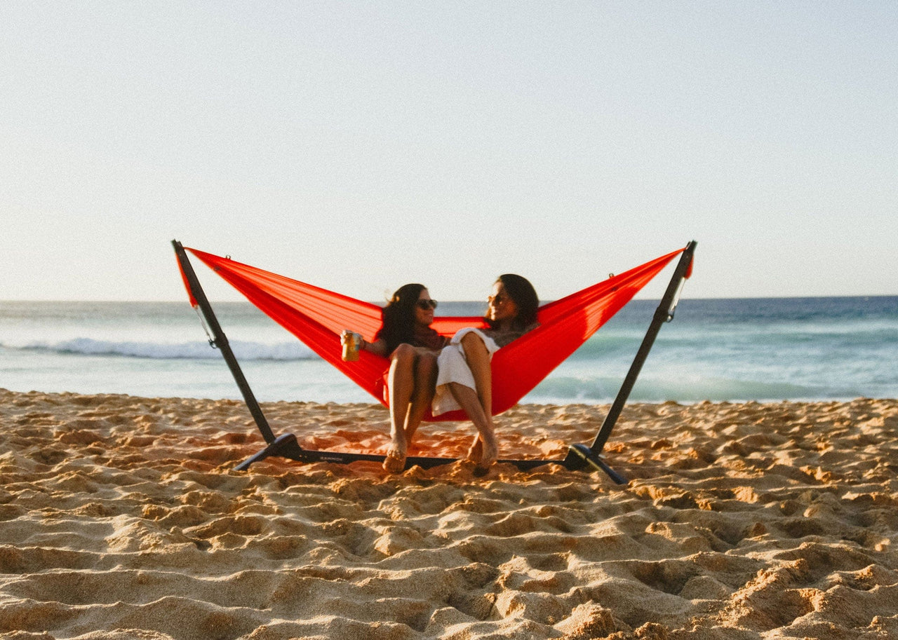 Women cheers on the beach in a Kammok Stand Swiftlet