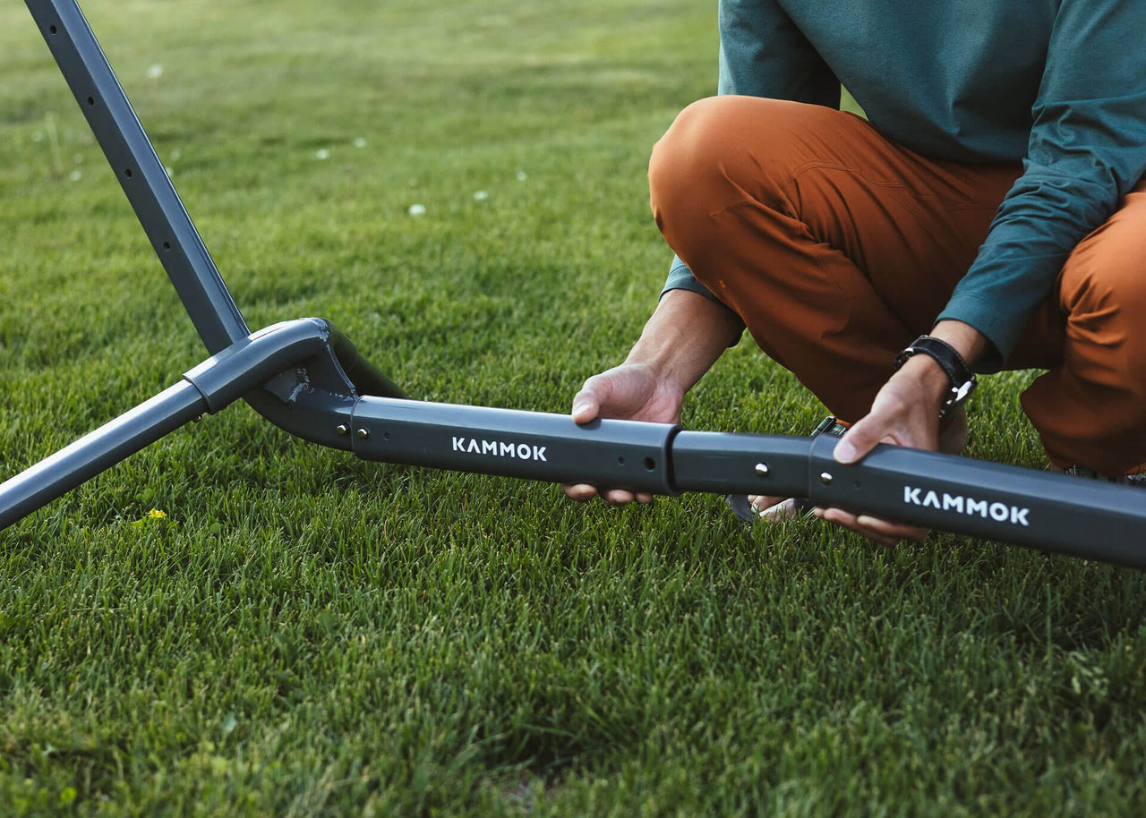 Close up of man adding in the Kammok Swiftlet Extension Bar