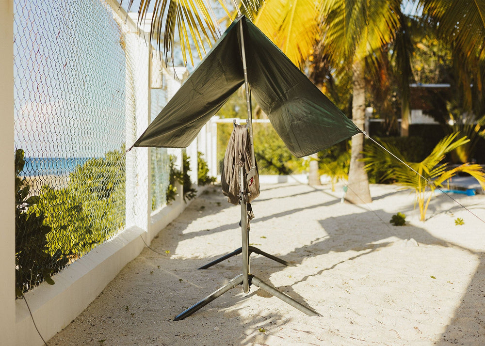 Swiftlet portable hammock stand with Granite Gray Roo Double and Swiftlet Shade Kit setup on beach.